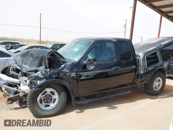 1999 Ford F-150 XL with VIN 1FTRX08L3XKB12260, listed as a IAAI auction lot 42244781 with Not provided miles and . Bid and sale history available at DreamBid. Image 13.