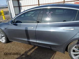 2020 Tesla Model 3 Long Range with VIN 5YJ3E1EB3LF801834, listed as a IAAI auction lot 42015079 with 47,793 mi miles. Bid and sale history available at carsss.com. Image 14.