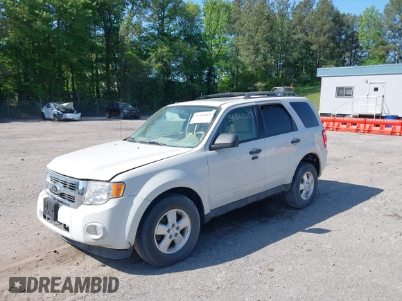 2012 Ford Escape XLT with VIN 1FMCU0D71CKC60534, listed as a IAAI auction lot 39305965 with 120,198 mi miles and . Bid and sale history available at DreamBid. Image 2.