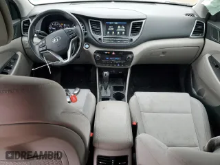 2018 Hyundai Tucson Value with VIN KM8J33A28JU748241, listed as a Copart auction lot 87492464 with 56,457 mi miles and Salvage Title. Bid and sale history available at carsss.com. Image 8.