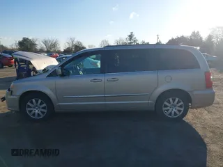 2015 Chrysler Town & Country Touring with VIN 2C4RC1BG8FR537647, listed as a IAAI auction lot 41888638 with 146,866 mi miles. Bid and sale history available at carsss.com. Image 14.