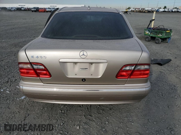2001 Mercedes-Benz E-Class with VIN WDBJF70JX1B220786, listed as a Copart auction lot 71808344 with 94,476 mi miles and Salvage Title. Bid and sale history available at carsss.com. Image 6.