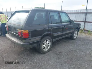 1999 Land Rover Range Rover z VIN SALPV1440XA412936, wystawiony jako IAAI lot #42271704 z przebiegiem 156 881 mil mil oraz . Historia ofert i sprzedaży dostępna na DreamBid. Obrazek 4.