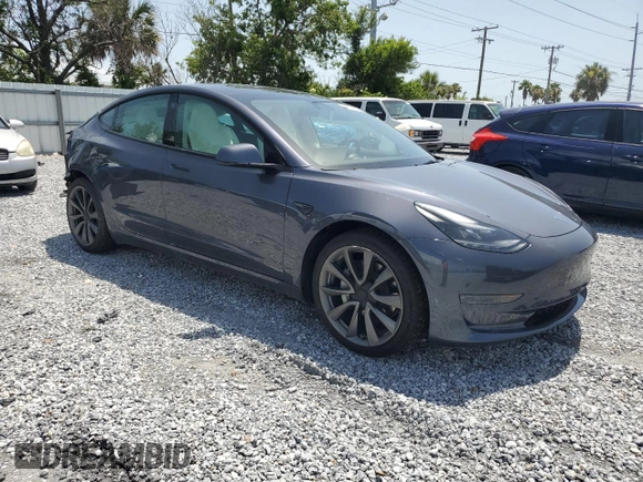 2023 Tesla Model 3 z VIN 5YJ3E1EA0PF571943, wystawiony jako Copart lot #58338235 z przebiegiem 41 584 mil mil oraz Szkoda całkowita • Salvage title. Historia ofert i sprzedaży dostępna na DreamBid. Obrazek 4.