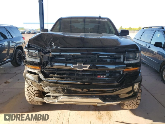 2017 Chevrolet Silverado 1500 LT with VIN 3GCUKREC1HG363756, listed as a Copart auction lot 54429565 with 182,515 mi miles and Salvage Title. Bid and sale history available at DreamBid. Image 5.