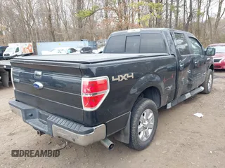 2013 Ford F-150 XL with VIN 1FTFW1ET4DFB13826, listed as a IAAI auction lot 42010957 with 209,848 mi miles. Bid and sale history available at carsss.com. Image 4.