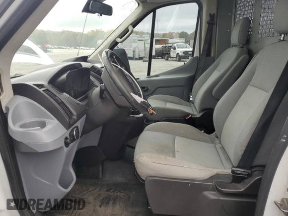 2016 Ford Transit Cargo with VIN 1FTYR2CG9GKA15172, listed as a Copart auction lot 87537575 with 214,227 mi miles and Salvage title. Bid and sale history available at DreamBid. Image 7.