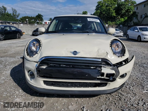 2021 MINI Hardtop Cooper с VIN WMWXR3C08M2N99822, выставлен на аукционе Copart как лот 80380884 с пробегом 21 257 миль миль и Списание • Salvage title. История ставок и продаж доступна на DreamBid. Изображение 5.