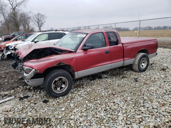 1999 Dodge Dakota SLT with VIN 1B7GL22X0XS268203, listed as a Copart auction lot 85155594 with 185,142 mi miles and Salvage Title. Bid and sale history available at carsss.com. Image 1.