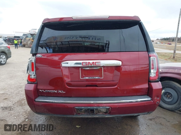 2016 GMC Yukon XL Denali with VIN 1GKS1HKJXGR453840, listed as a IAAI auction lot 41057135 with 105,469 mi miles. Bid and sale history available at carsss.com. Image 17.