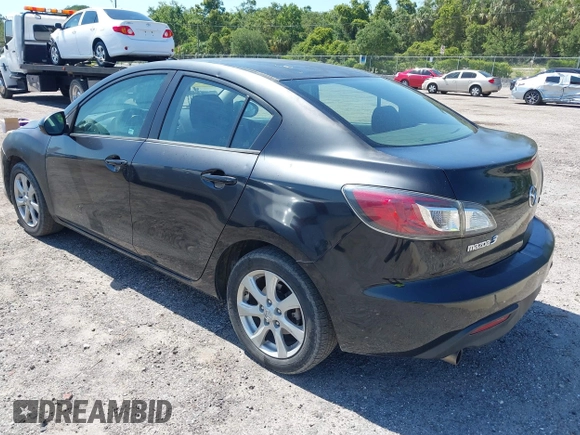2011 Mazda 3 i Touring z VIN JM1BL1VG3B1398409, wystawiony jako IAAI lot #42281126 z przebiegiem 134 001 mil mil oraz . Historia ofert i sprzedaży dostępna na DreamBid. Obrazek 3.