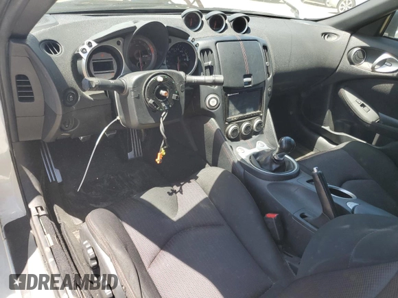 2011 Nissan 370Z Touring z VIN JN1AZ4EH7BM551606, wystawiony jako Copart lot #57173945 z przebiegiem Nie podano mil oraz Szkoda całkowita • Salvage title. Historia ofert i sprzedaży dostępna na DreamBid. Obrazek 8.