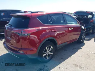 2018 Toyota RAV4 XLE with VIN 2T3WFREV8JW425464, listed as a IAAI auction lot 41977877 with 142,265 mi miles and . Bid and sale history available at carsss.com. Image 4.