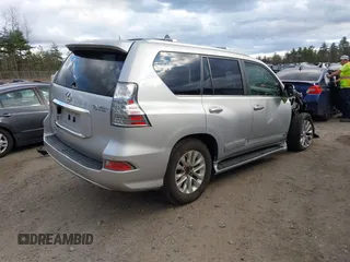 2014 Lexus GX with VIN JTJBM7FX3E5084445, listed as a IAAI auction lot 40640676 with 77,486 mi miles. Bid and sale history available at carsss.com. Image 4.
