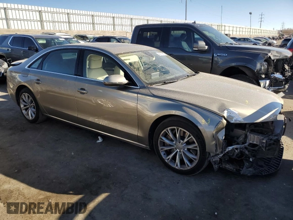 2012 Audi A8 with VIN WAURVAFDXCN001749, listed as a Copart auction lot 44379515 with 169,860 mi miles and Salvage Title. Bid and sale history available at DreamBid. Image 4.