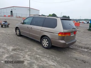 2004 Honda Odyssey EX-L z VIN 5FNRL189X4B036406, wystawiony jako IAAI lot #42368037 z przebiegiem 177 513 mil mil oraz . Historia ofert i sprzedaży dostępna na DreamBid. Obrazek 3.