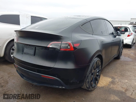 2022 Tesla Model Y Performance z VIN 7SAYGDEF4NF350696, wystawiony jako IAAI lot #41662924 z przebiegiem 36 747 mil mil oraz . Historia ofert i sprzedaży dostępna na DreamBid. Obrazek 4.
