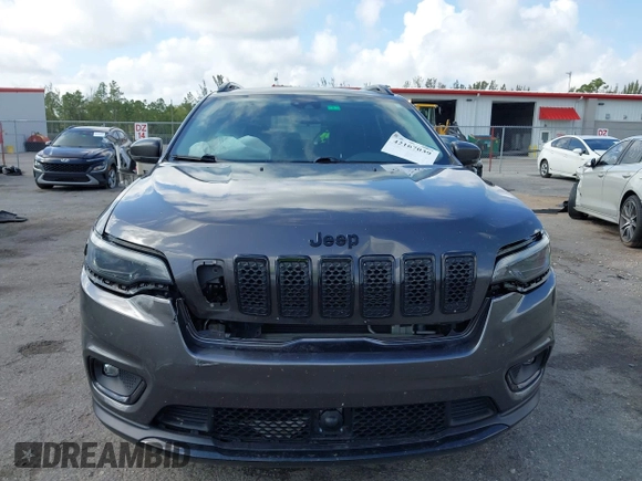 2021 Jeep Cherokee Latitude Plus with VIN 1C4PJMLB6MD117029, listed as a IAAI auction lot 42167039 with 68,717 mi miles and . Bid and sale history available at DreamBid. Image 12.