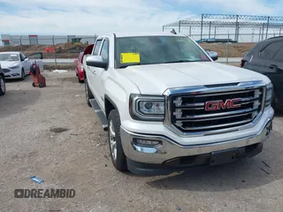 2018 GMC Sierra 1500 SLT with VIN 3GTP1NEC5JG196414, listed as a IAAI auction lot 42327005 with 130,068 mi miles and . Bid and sale history available at DreamBid. Image 1.