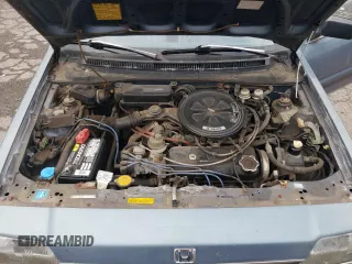 1987 Honda Civic z VIN 1HGEC4638HA016153, wystawiony jako Copart lot #73868274 z przebiegiem 22 876 mil mil oraz Tytuł czysty. Historia ofert i sprzedaży dostępna na DreamBid. Obrazek 11.