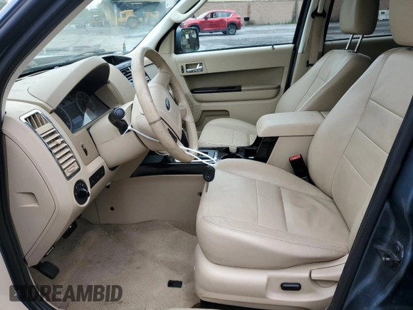 2010 Ford Escape Limited with VIN 1FMCU9EG1AKC75518, listed as a Copart auction lot 61332425 with 90,017 mi miles and Salvage title. Bid and sale history available at DreamBid. Image 7.