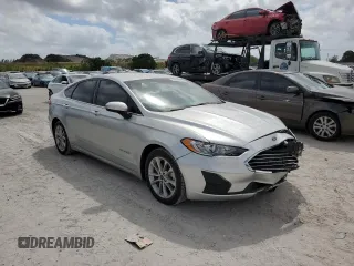 2019 Ford Fusion Hybrid SE with VIN 3FA6P0LUXKR107120, listed as a Copart auction lot 46972153 with 87,197 mi miles. Bid and sale history available at carsss.com. Image 4.