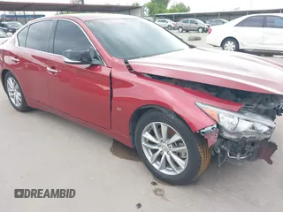 2014 Infiniti Q50 Premium z VIN JN1BV7AP8EM673359, wystawiony jako IAAI lot #42300427 z przebiegiem 118 779 mil mil oraz . Historia ofert i sprzedaży dostępna na DreamBid. Obrazek 18.
