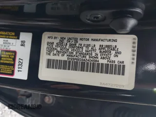 2010 Pontiac Vibe w/1SB with VIN 5Y2SP6E03AZ404584, listed as a IAAI auction lot 41133592 with 199,271 mi miles. Bid and sale history available at carsss.com. Image 9.
