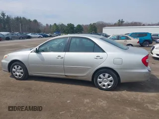 2004 Toyota Camry LE with VIN 4T1BE32K94U928118, listed as a IAAI auction lot 42095320 with 129,266 mi miles and . Bid and sale history available at DreamBid. Image 6.