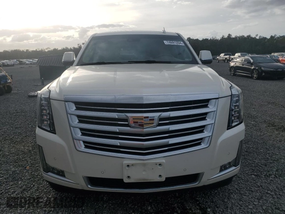 2015 Cadillac Escalade Platinum z VIN 1GYS4PKJ5FR574930, wystawiony jako Copart lot #74691204 z przebiegiem Nie podano mil oraz Szkoda całkowita • Salvage title. Historia ofert i sprzedaży dostępna na DreamBid. Obrazek 5.