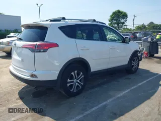 2017 Toyota RAV4 LE with VIN JTMBFREV8HJ157555, listed as a IAAI auction lot 42147300 with 81,187 mi miles and . Bid and sale history available at DreamBid. Image 4.