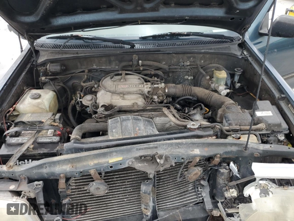 1994 Toyota T100 DX with VIN JT4VD10A6R0017701, listed as a Copart auction lot 46034975 with 219,651 mi miles and Salvage Title. Bid and sale history available at DreamBid. Image 11.