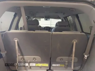 2009 Kia Sedona LX with VIN KNDMB233X96276905, listed as a IAAI auction lot 41394768 with 231,156 mi miles. Bid and sale history available at carsss.com. Image 8.
