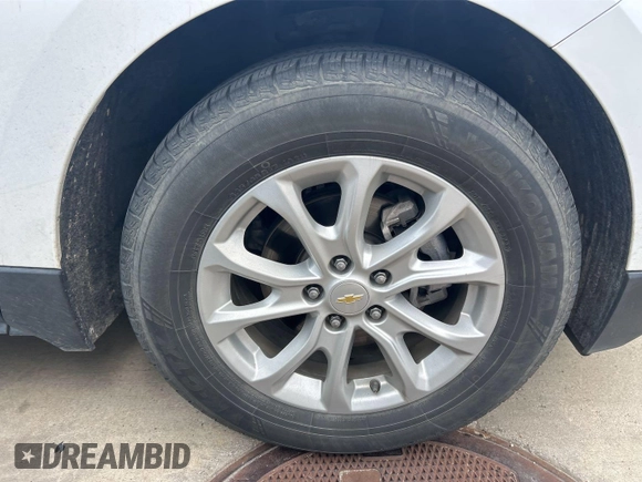 2018 Chevrolet Equinox LT with VIN 2GNAXJEV1J6317277, listed as a IAAI auction lot 42214671 with 107,694 mi miles and . Bid and sale history available at carsss.com. Image 1.