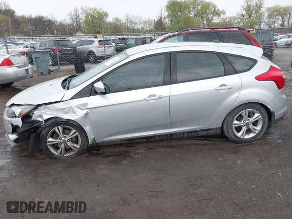 2012 Ford Focus SE z VIN 1FAHP3K27CL152803, wystawiony jako IAAI lot #42058556 z przebiegiem 181 717 mil mil oraz . Historia ofert i sprzedaży dostępna na DreamBid. Obrazek 14.