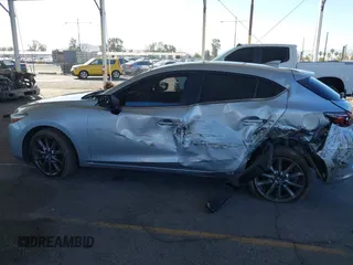 2018 Mazda 3 Touring with VIN 3MZBN1L31JM163466, listed as a IAAI auction lot 40777124 with 101,497 mi miles and . Bid and sale history available at carsss.com. Image 13.