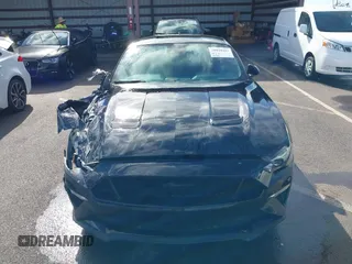 2021 Ford Mustang GT z VIN 1FA6P8CF1M5147740, wystawiony jako IAAI lot #38920487 z przebiegiem 15 299 mil mil oraz . Historia ofert i sprzedaży dostępna na DreamBid. Obrazek 12.