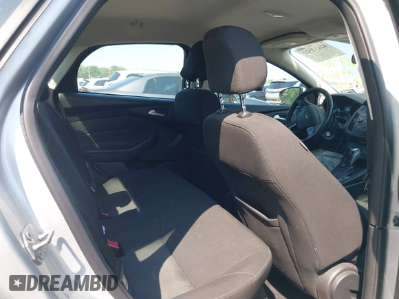 2015 Ford Focus SE with VIN 1FADP3F25FL381008, listed as a IAAI auction lot 42413322 with 106,353 mi miles and . Bid and sale history available at DreamBid. Image 8.