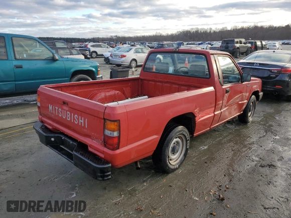 1991 Mitsubishi Mighty Max z VIN JA7FL24W3MP017705, wystawiony jako Copart lot #85737304 z przebiegiem 261 896 mil mil oraz Szkody całkowita. Historia ofert i sprzedaży dostępna na DreamBid. Obrazek 3.