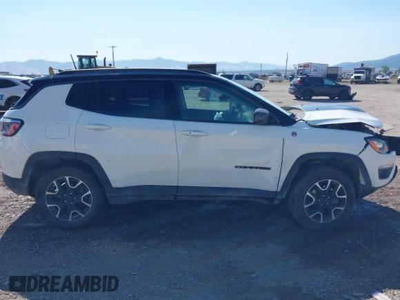 2021 Jeep Compass Trailhawk with VIN 3C4NJDDB0MT551172, listed as a IAAI auction lot 40155947 with 50,794 mi miles and . Bid and sale history available at DreamBid. Image 13.