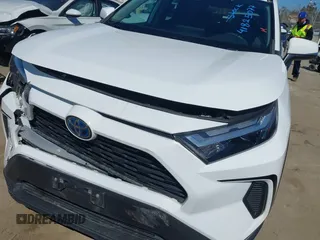 2023 Toyota RAV4 Hybrid XLE with VIN 4T3RWRFV2PU085104, listed as a IAAI auction lot 41825077 with 110,877 mi miles. Bid and sale history available at carsss.com. Image 6.