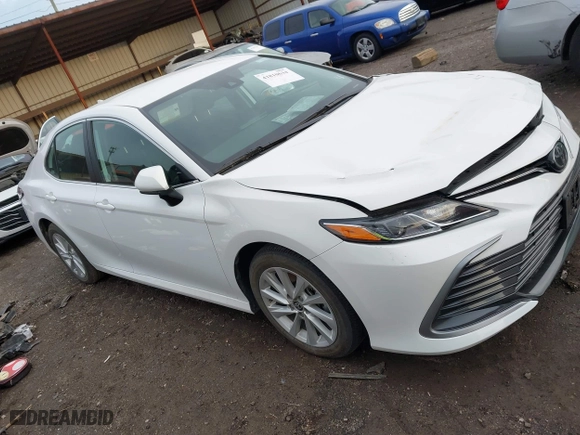 2024 Toyota Camry LE with VIN 4T1C11AK5RU899617, listed as a IAAI auction lot 41810634 with 24,295 mi miles. Bid and sale history available at carsss.com. Image 14.