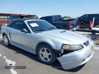 2001 Ford Mustang Deluxe z VIN 1FAFP44451F208230, wystawiony jako IAAI lot #42191956 z przebiegiem 118 287 mil mil oraz . Historia ofert i sprzedaży dostępna na DreamBid. Obrazek 1.