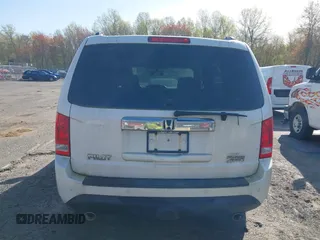 2013 Honda Pilot Touring with VIN 5FNYF4H97DB069979, listed as a IAAI auction lot 42133922 with 276,574 mi miles and . Bid and sale history available at carsss.com. Image 16.