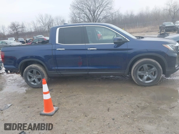 2022 Honda Ridgeline RTL-E with VIN 5FPYK3F72NB036226, listed as a IAAI auction lot 41706285 with 30,869 mi miles and . Bid and sale history available at DreamBid. Image 14.