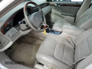2003 Cadillac DeVille DTS z VIN 1G6KF57993U201484, wystawiony jako Copart lot #43742375 z przebiegiem 53 478 mil mil oraz Szkody całkowita. Historia ofert i sprzedaży dostępna na DreamBid. Obrazek 7.