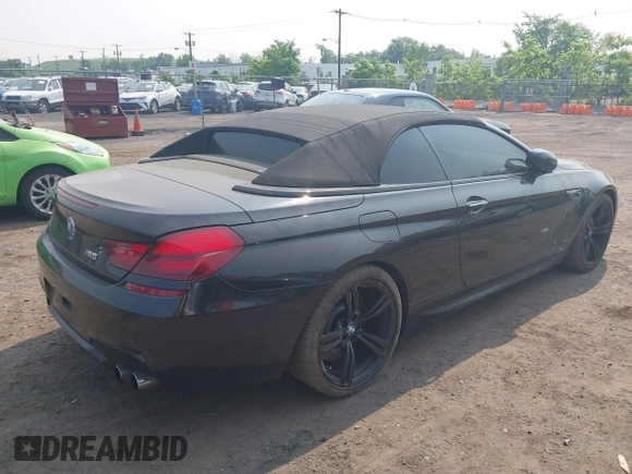 2014 BMW M6 z VIN WBSLZ9C5XEDZ78402, wystawiony jako IAAI lot #42399055 z przebiegiem 127 803 mil mil oraz . Historia ofert i sprzedaży dostępna na DreamBid. Obrazek 4.