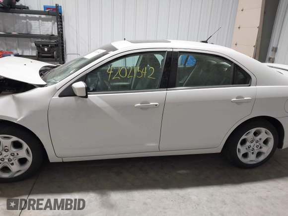 2010 Ford Fusion SE with VIN 3FAHP0HAXAR381861, listed as a IAAI auction lot 42021542 with 103,034 mi miles and . Bid and sale history available at carsss.com. Image 14.