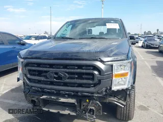 2023 Ford F-150 XL with VIN 1FTFW1ED8PFD08597, listed as a IAAI auction lot 41613094 with 7,266 mi miles and . Bid and sale history available at carsss.com. Image 12.