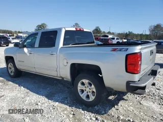 2018 Chevrolet Silverado 1500 LT with VIN 3GCUKREC0JG406702, listed as a Copart auction lot 48888915 with 115,943 mi miles and Salvage Title. Bid and sale history available at carsss.com. Image 2.